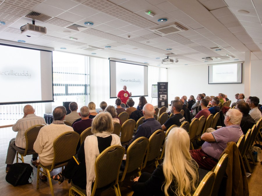 Photographer Damien McGillicuddy speaks at a previous Societies of Photographers Roadshow event