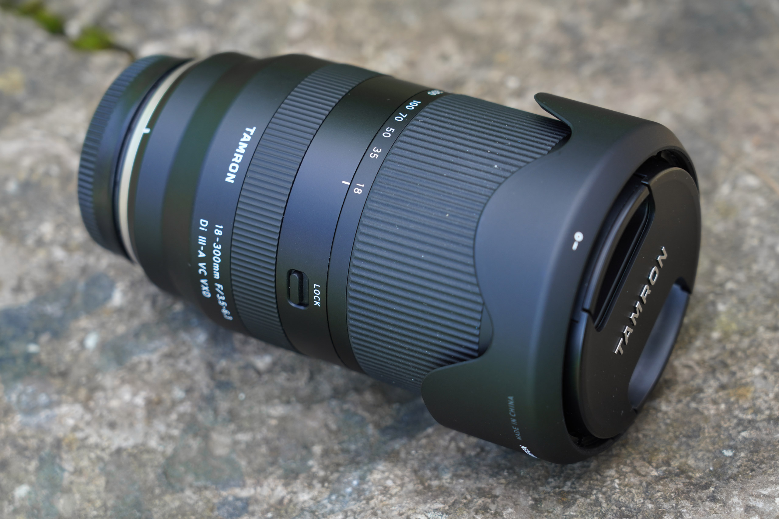 Tamron 18-300mm F/3.5-6.3 Di III-A VC lens with hood and lens cap