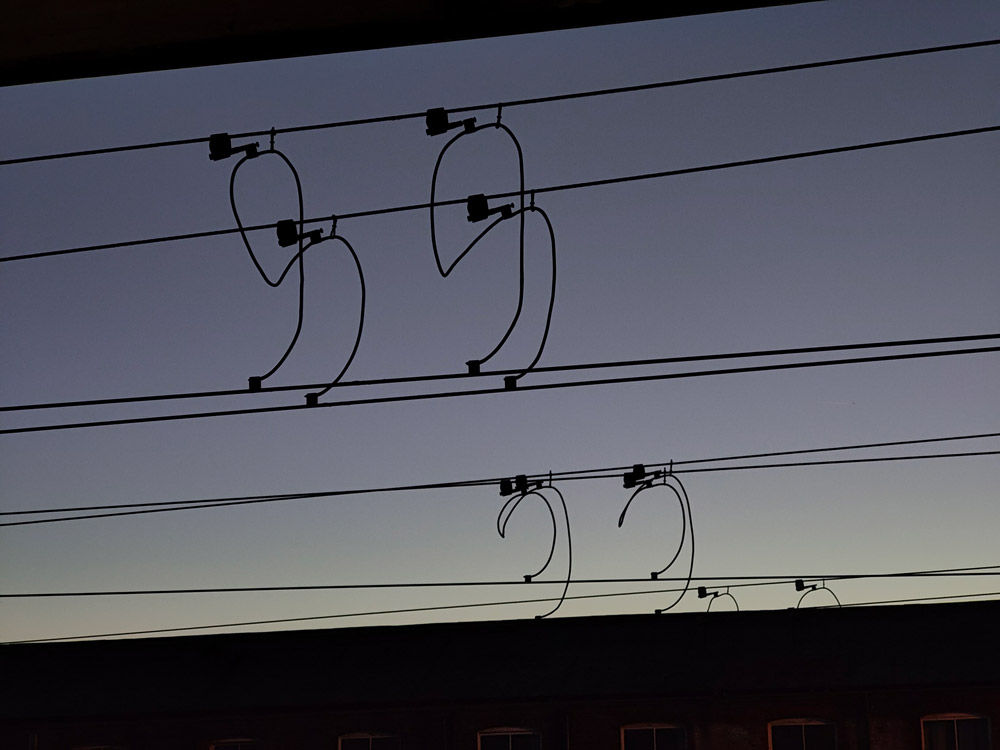 Overhead wires, almost look like notes on sheet music. Photo: Joshua Waller.