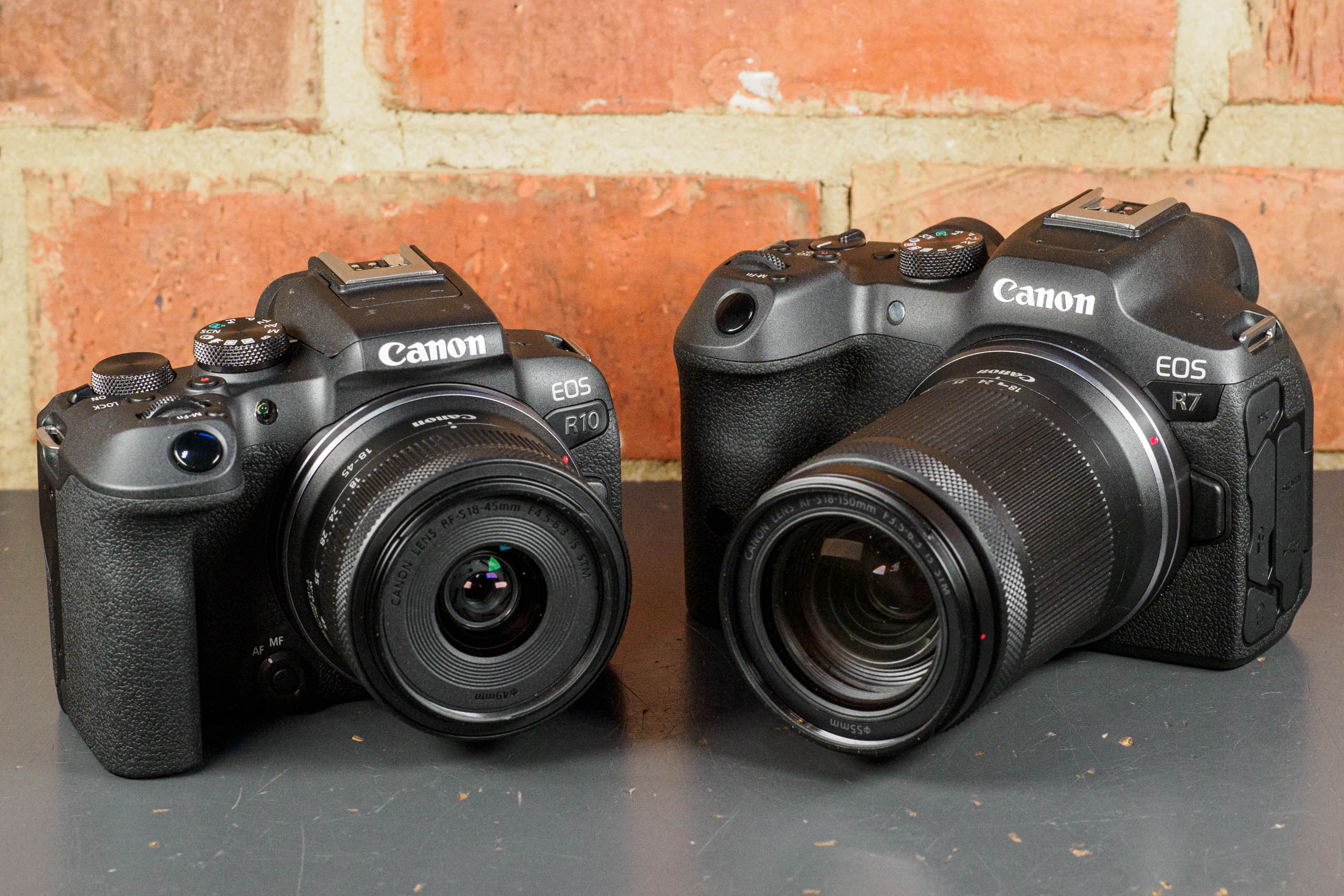 Canon EOS R10 +18-45mm beside Canon EOS R7 + 18-150mm