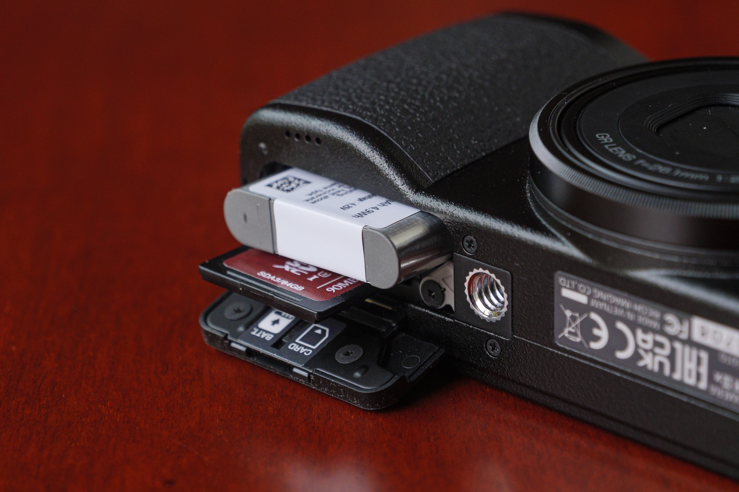 Ricoh GR IIIx battery and memory compartment
