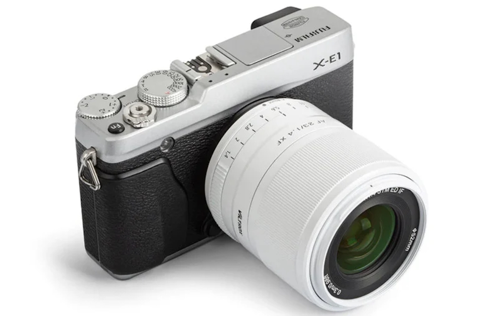 The 23mm F1.4 Viltrox white lens shown on a Fujifilm X-E1 camera body