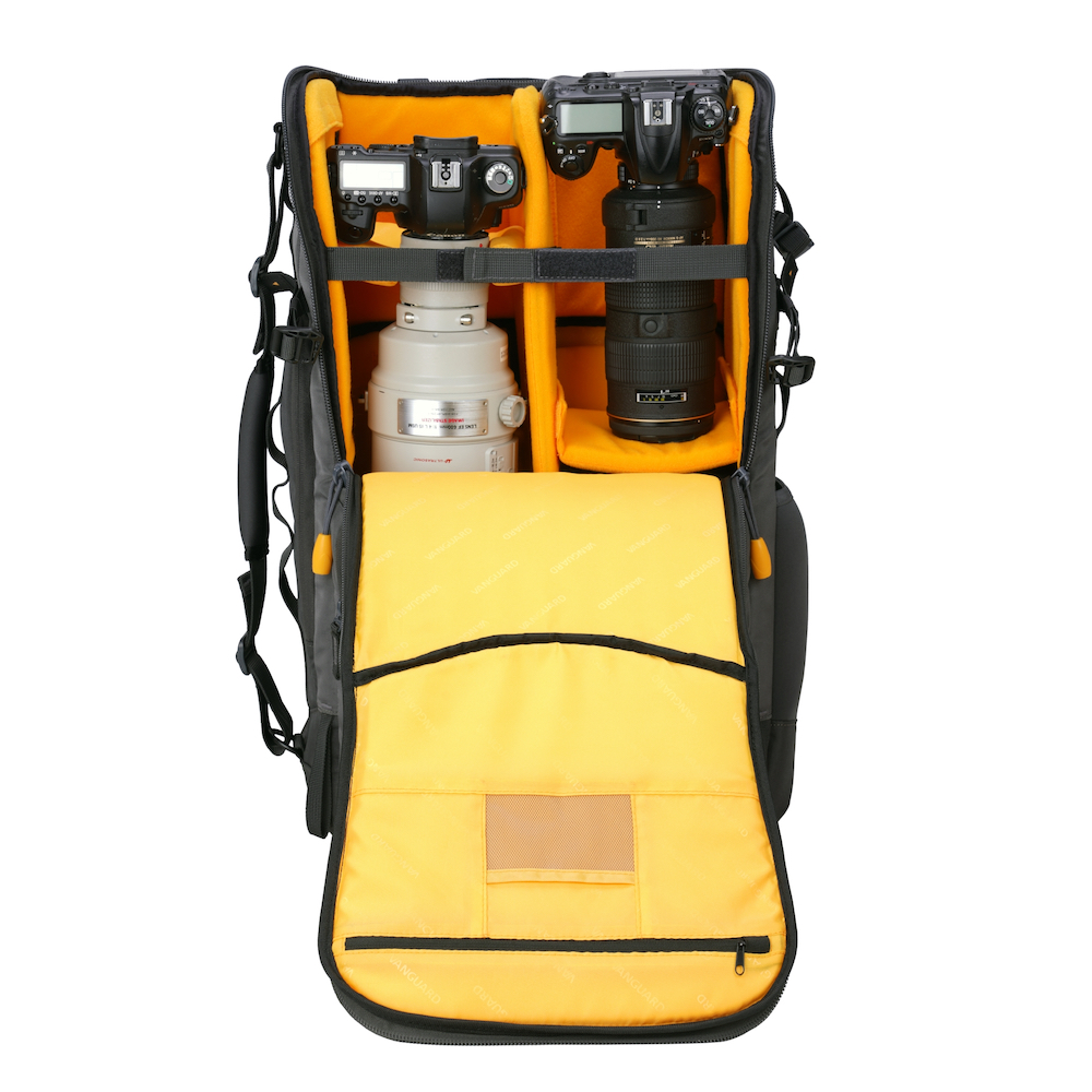 The Alta Sky 68 backpack shown open with cameras and lenses inside