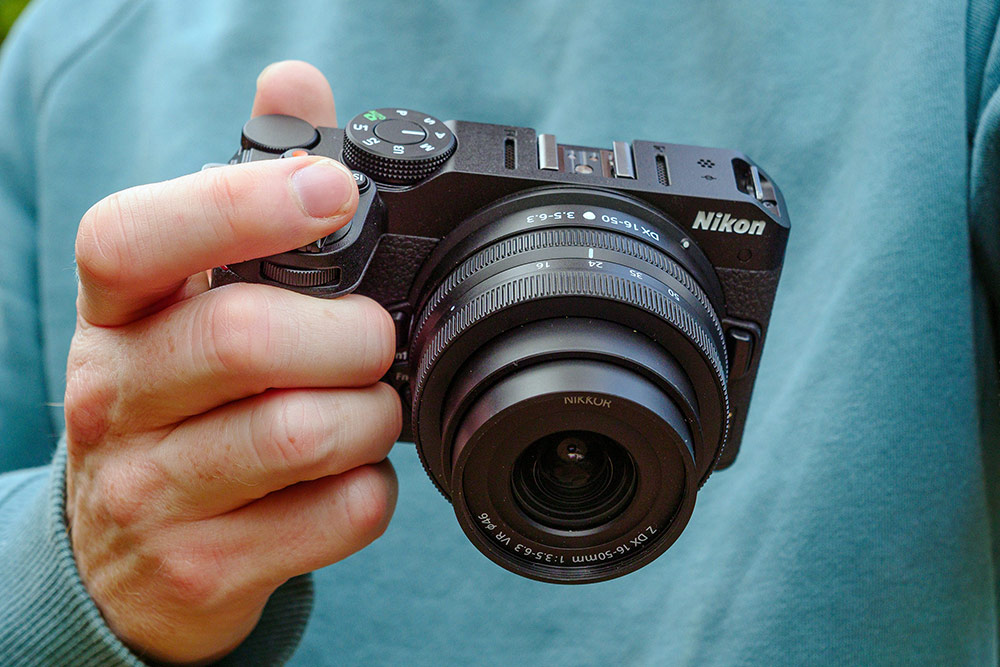 Best small mirrorless cameras: Nikon Z30 in hand