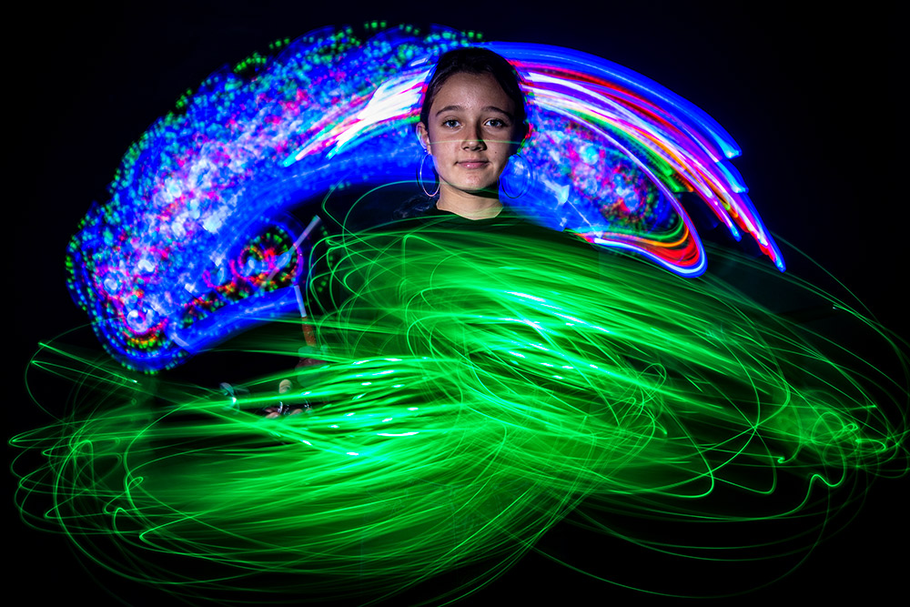 girl with light painting graphic