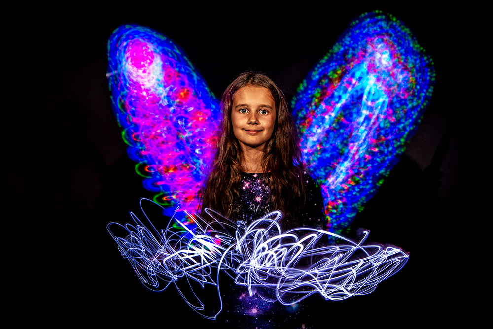 girl with light painting wings