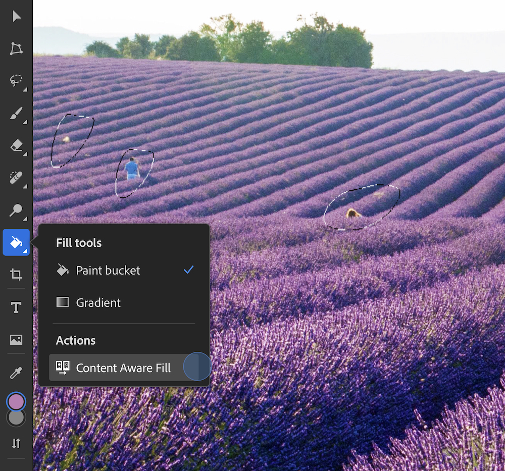 Using the Content-Aware Fill tool to remove unwanted people from an image