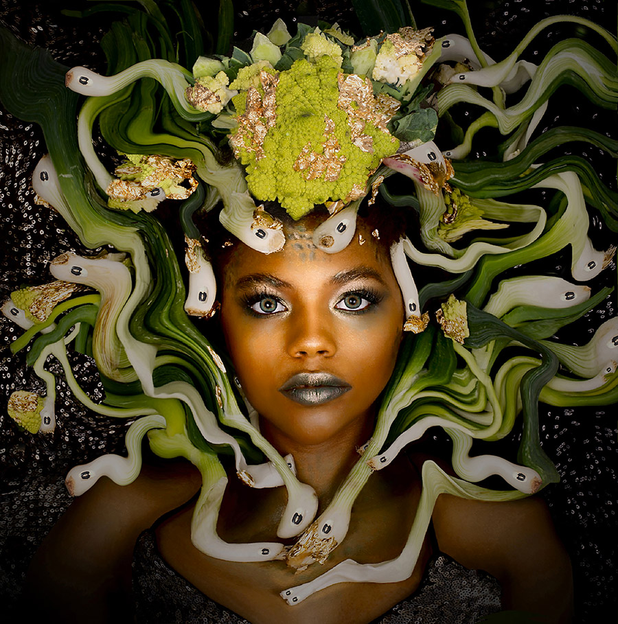 woman with medusa style hair in form of leeks and spring onions