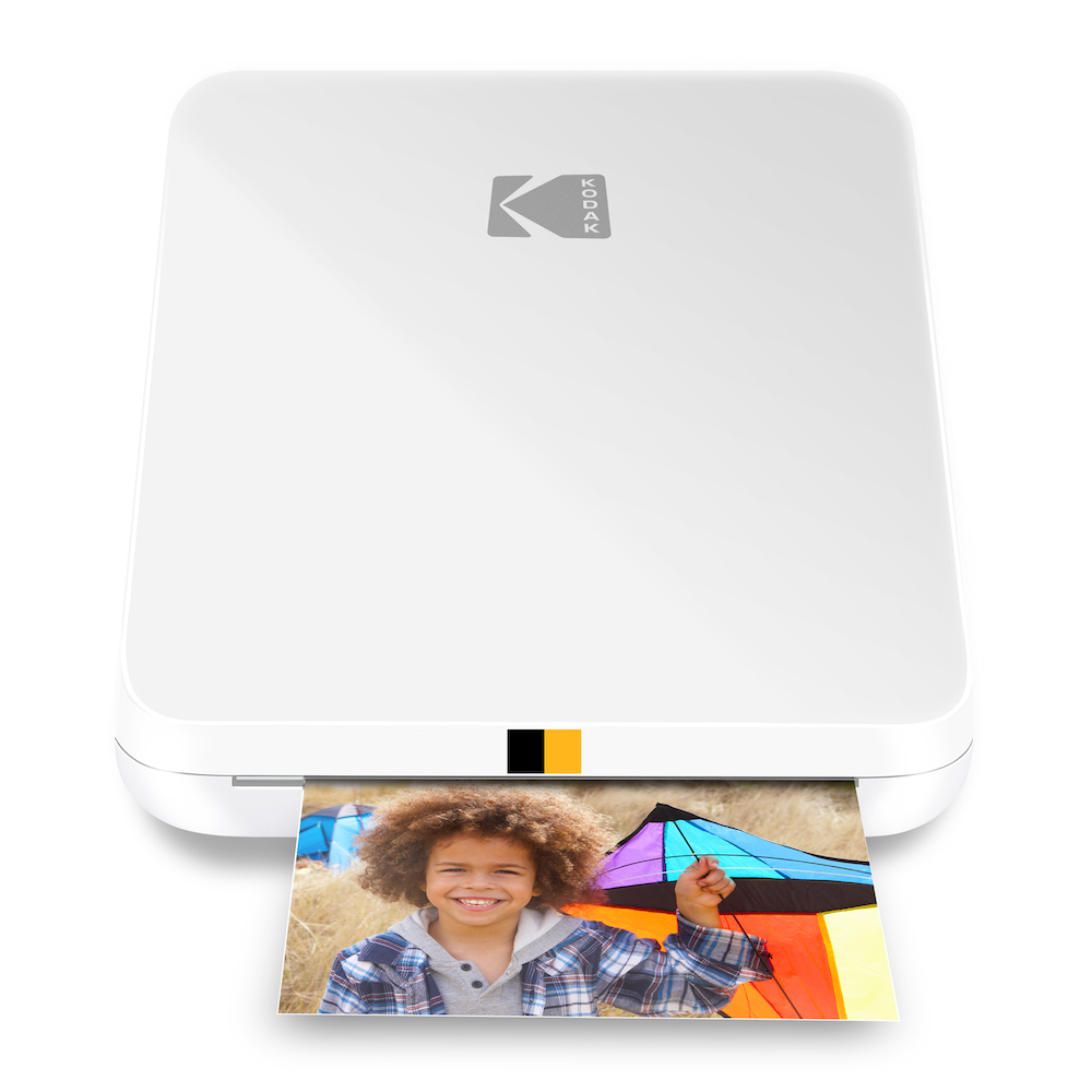 The Kodak STEP SLIM Instant Mobile Photo Printer comes in white and can produce 25 prints in a single charge 
