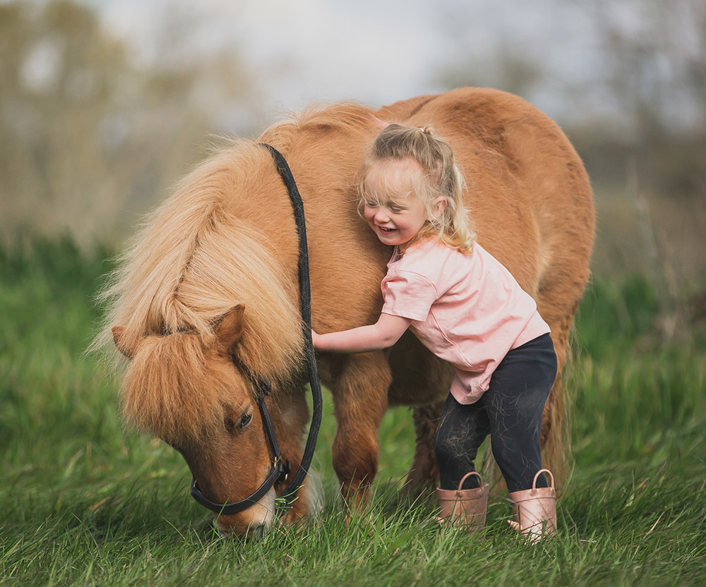 Jess and her first pony, Dotty. Image: Lucy Newson photography career