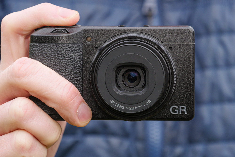 Ricoh GR IIIx in hand, close-up (Tim Coleman)