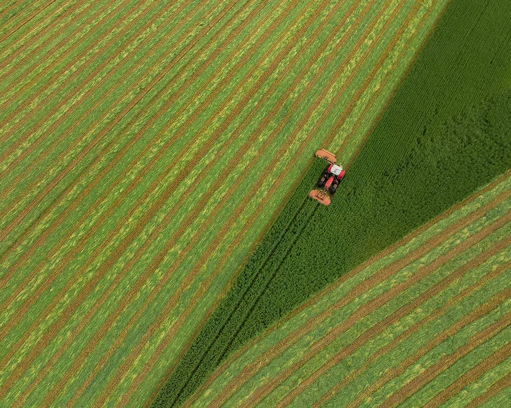 drone shot of farmer in the field best spring photographs