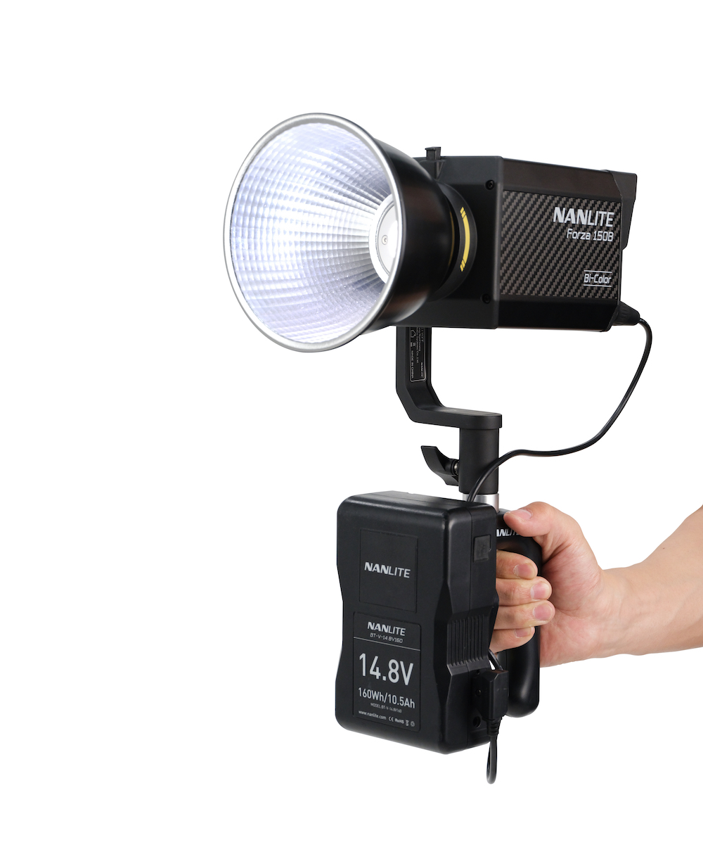 Hand-holding the Nanlite Forza 150B for on-the-go shooting