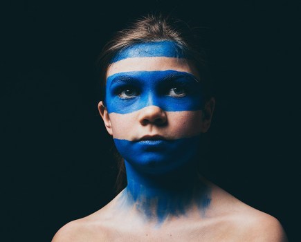 matthew vivian portrait of child with blue face paint