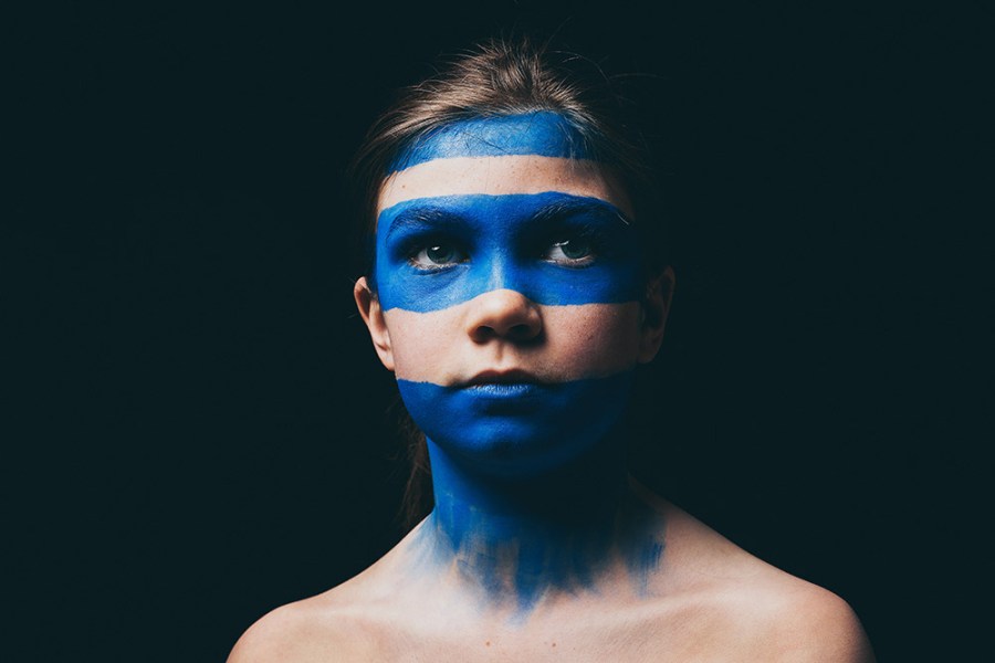 matthew vivian portrait of child with blue face paint