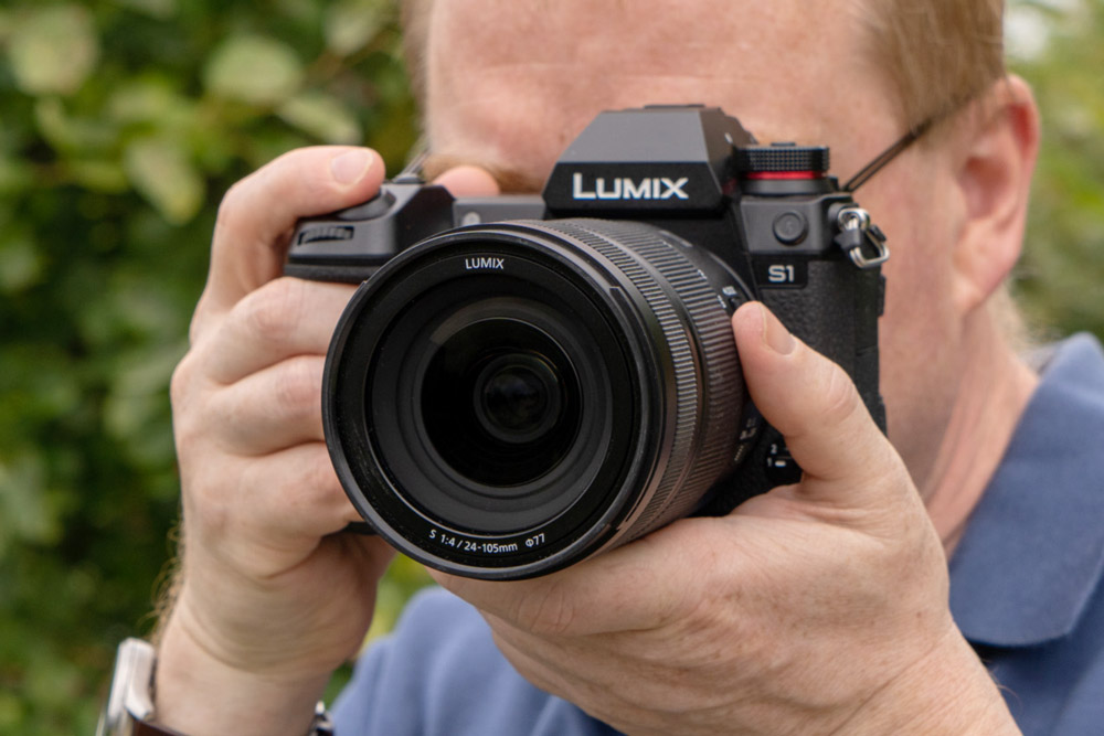 The best Panasonic cameras: Panasonic Lumix S1 in hand, Andy Westlake
