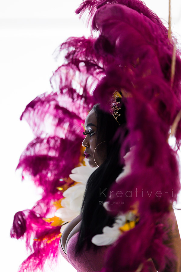 carnival slayers photoshoot close up of pink carnival feathers