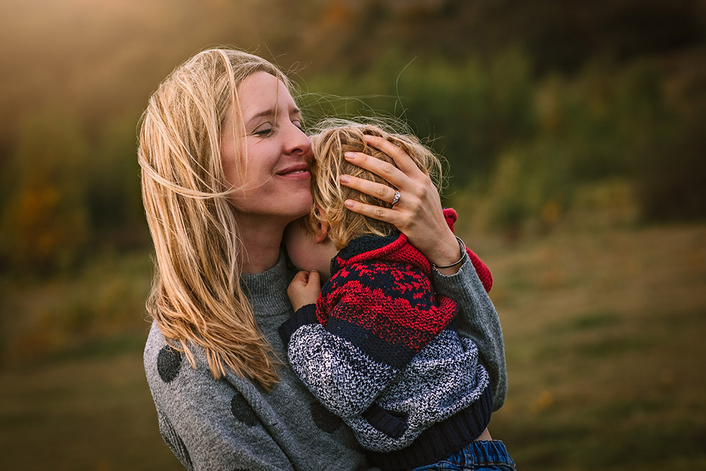 woman embracing child by Caroline Allington - UK Winner EISA Maestro 2022
