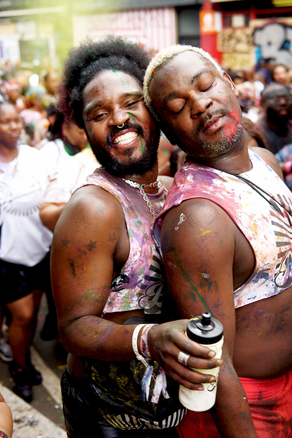 two people posing at notting hill carnival