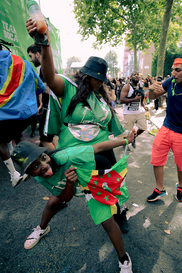 two people dancing at notting hill carnival