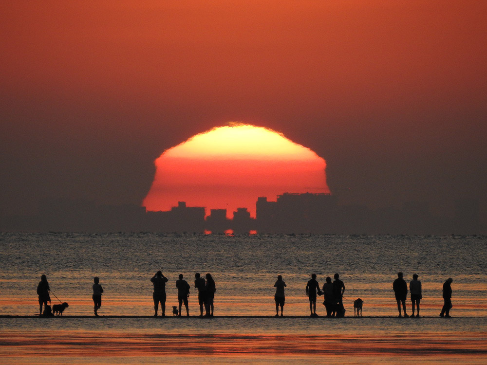 "Mock Mirage Sunset over the Estuary" by Brendan Conway, shortlisted for Weather Photographer of the Year 2022.