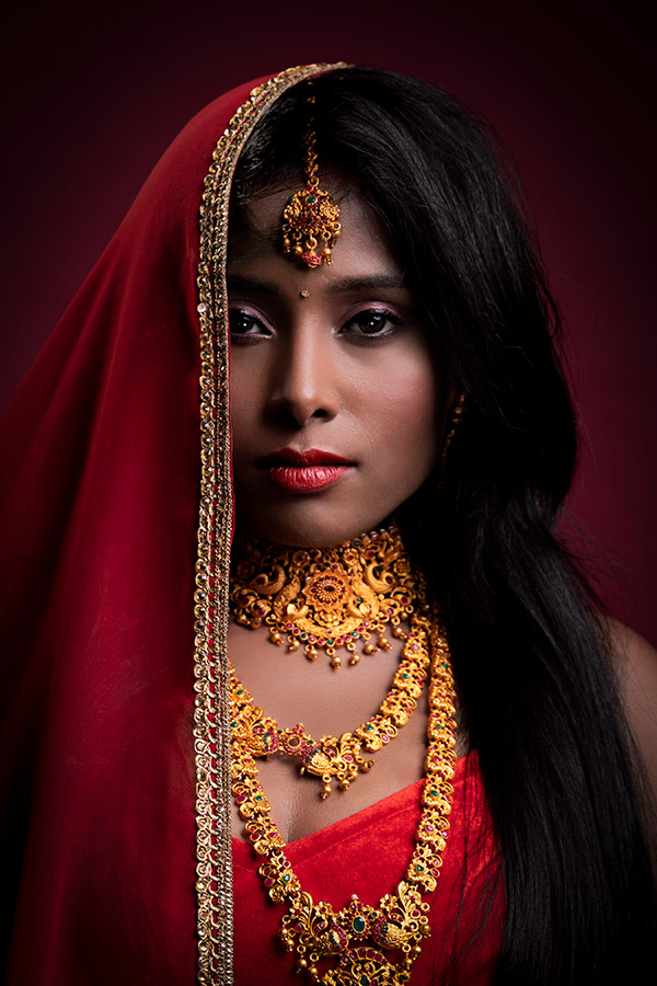 indian bride portrait wearing red apoy round seven