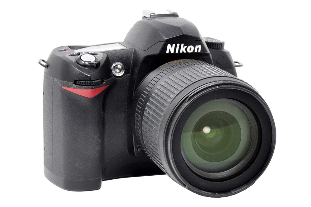 Nikon D70 DSLR photographed on white background