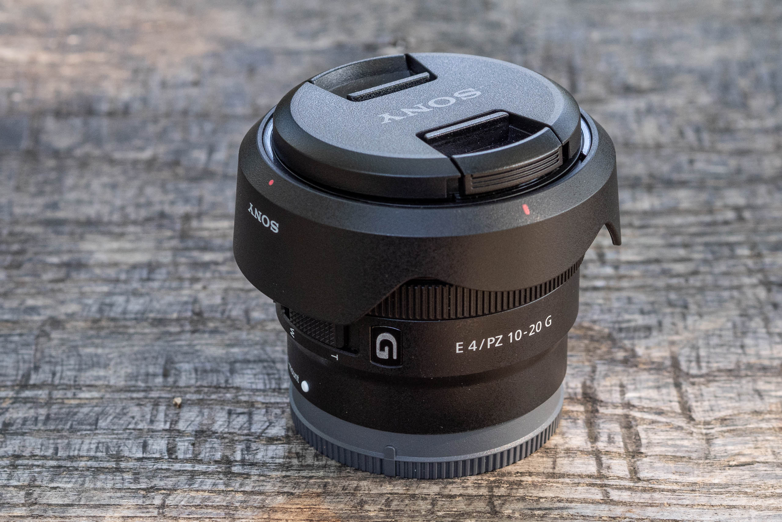 Sony E PZ 10-20mm F4 G with lens caps and hood reversed