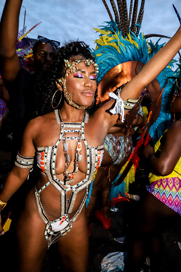 woman in carnival outfit dancing