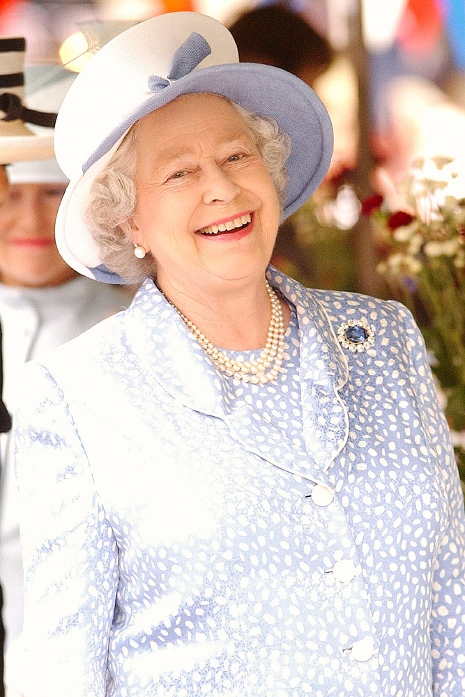 Queen Elizabeth II pictured in the market at Ludlow, England, 2003. © James Watkins.