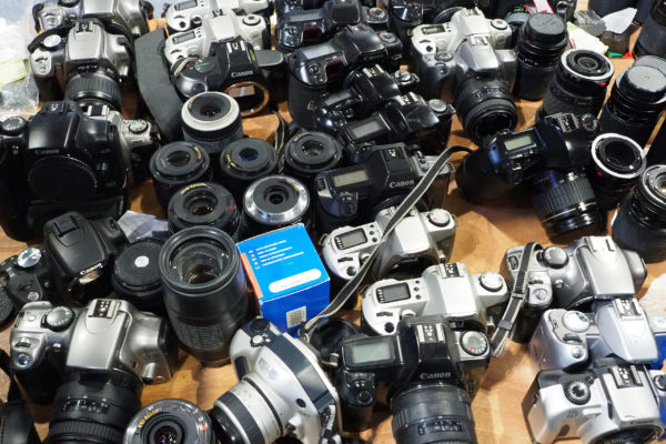 Just a small selection of the second-hand film cameras on the Disabled Photographers' Society stand at The Photography Show 2022, photo: Joshua Waller