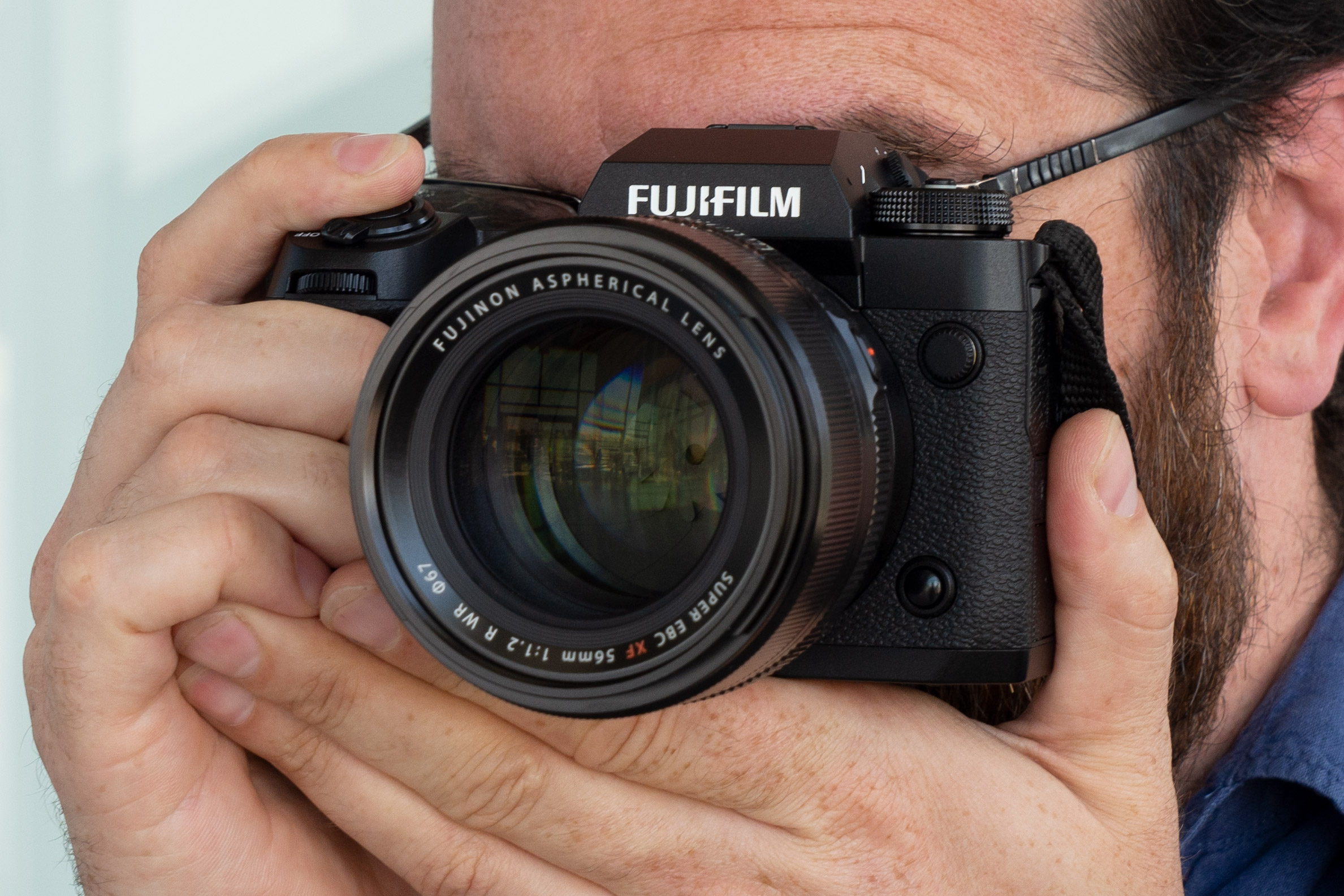 Fujifilm Fujinon XF 56mm F1.2 R WR lens on the Fujifilm X-H2, in hand, JW