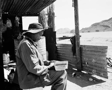 Jo Ractliffe Petrus Jacobus (‘Piet’) Basson reading the book of Luke, Vredesvallei (from the series The Borderlands), 2013 Recipient of an Honorary Fellowship