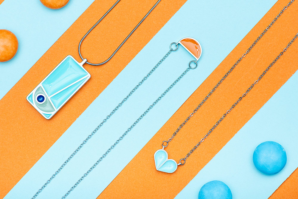 Get creative when photographing jewellery from using bright colours to bringing in props. Jewellery by Lawrence Gibson. Supplied for the photo shoot by Little Blue Budgie. Photo copyright: Claire Gillo