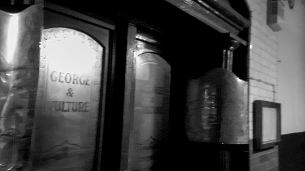 ghost camera looking at pub doors in london
