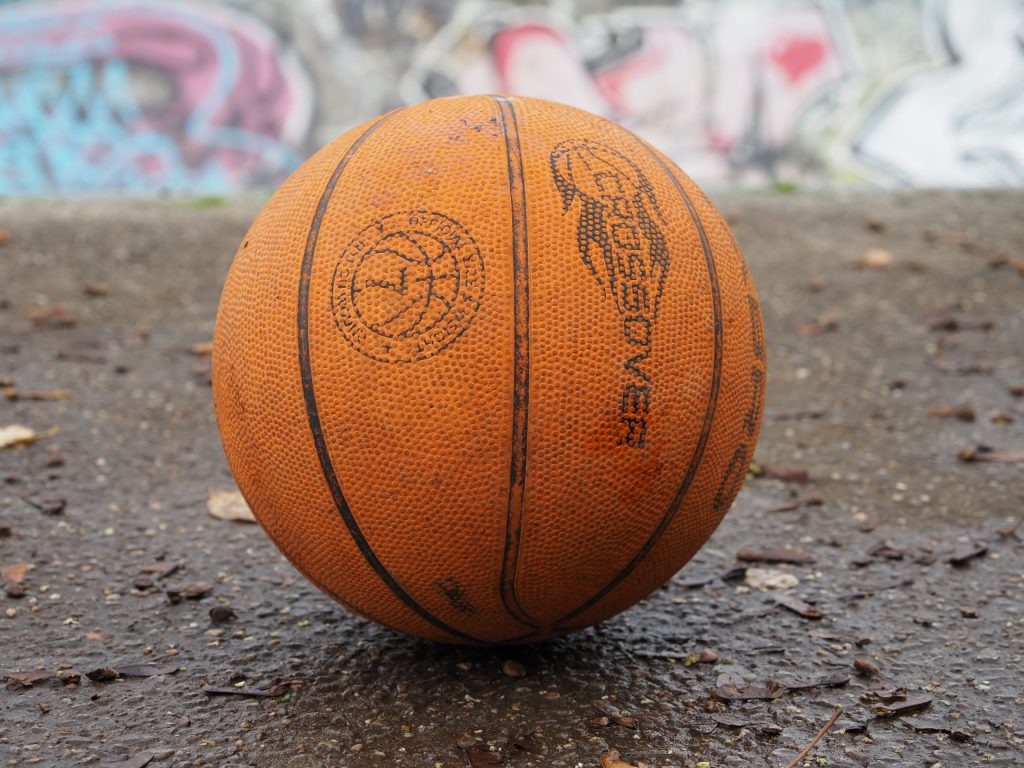 An orange basketball, taken with the Natural colour setting, on a grey day, 1/100s, f/4.5, ISO200, 45mm, Photo: Joshua Waller