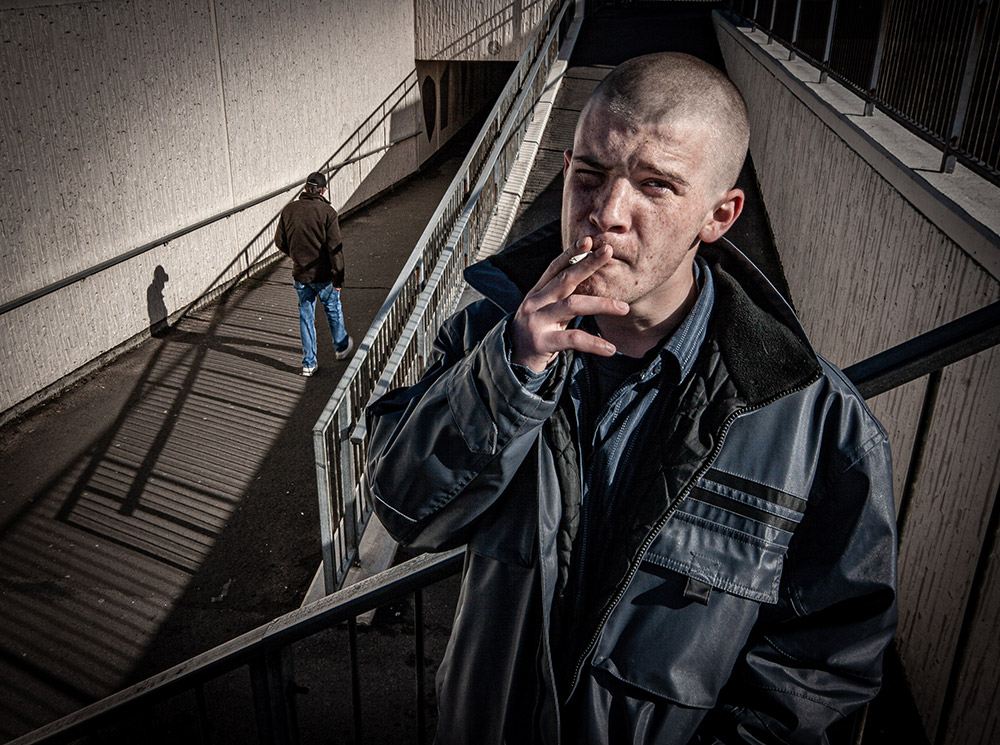 Steve Gouldstone man on stairs smoking