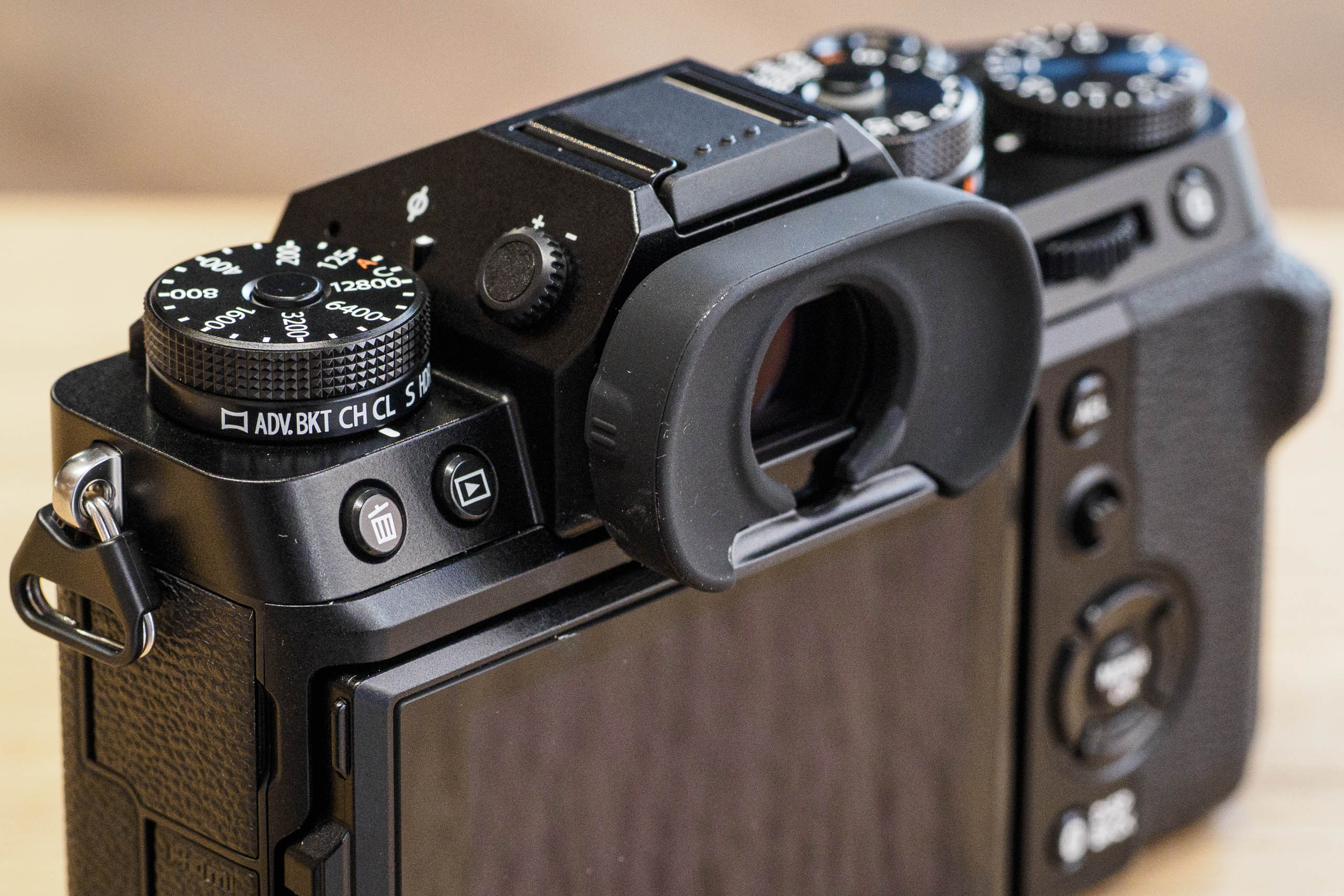 Fujifilm X-T5 drive mode switch, top plate controls and viewfinder