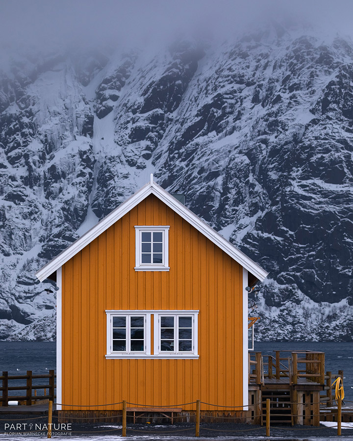 red hut in lofoten landscape