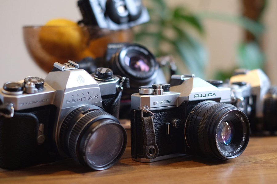 Film SLR cameras group shot - how to check if a film camera works