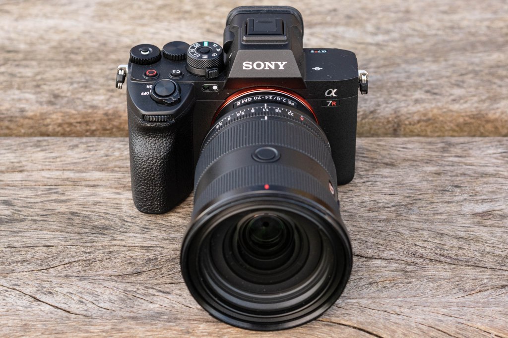 Sony A7R V mirrorless camera with lens attached.