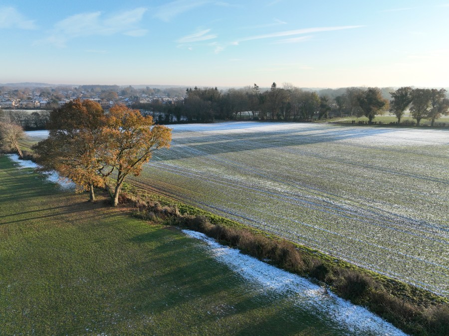 view of field with light snow dusting taken from above with dji mavic 3 classic