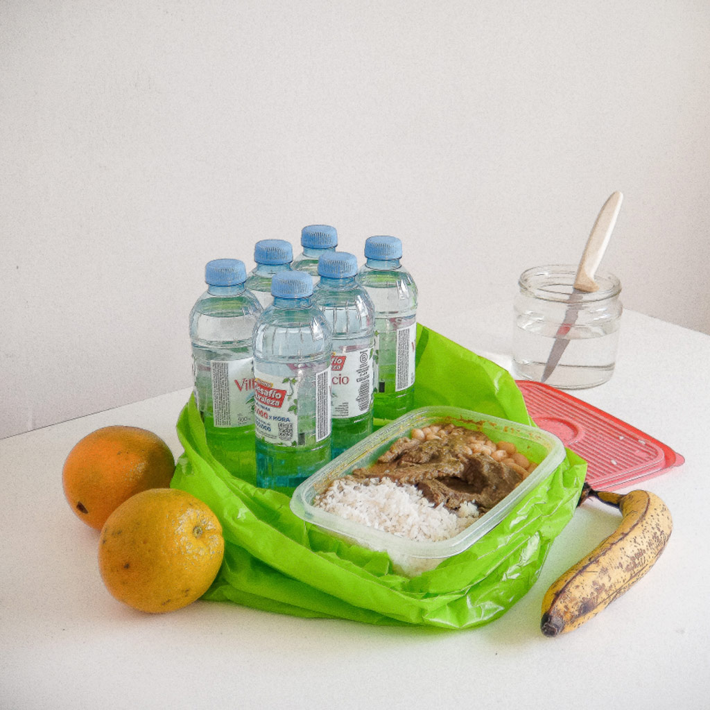 Sony World Photography Awards 2023 Professional Competition Professional Still Life Finalist Carloman Macidiano Cespedes Riojas. Still life shot of dried lamb, water bottles, and fruit.