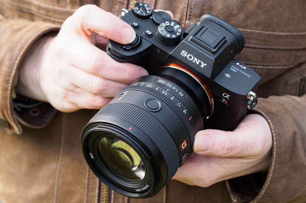 Sony FE 50mm F1.4 GM on Sony Alpha A7R IV in hand