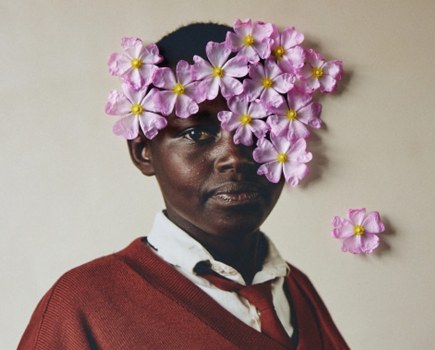 Sony World Photography Awards 2023 Professional Competition Professional Creative Finalist Lee-Ann Olwage. Fine art photography portrait photography. Portrait of a young woman with flowers on her face.