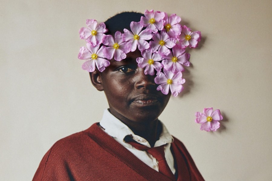 Sony World Photography Awards 2023 Professional Competition Professional Creative Finalist Lee-Ann Olwage. Fine art photography portrait photography. Portrait of a young woman with flowers on her face.