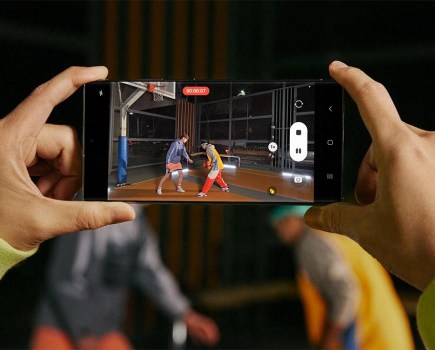 Samsung S23 Ultra being used to record video, held in a person's hands.
