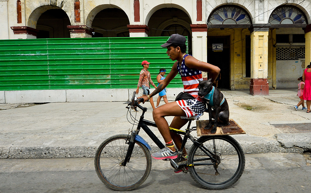 cyclist on havana street, best cities for photography