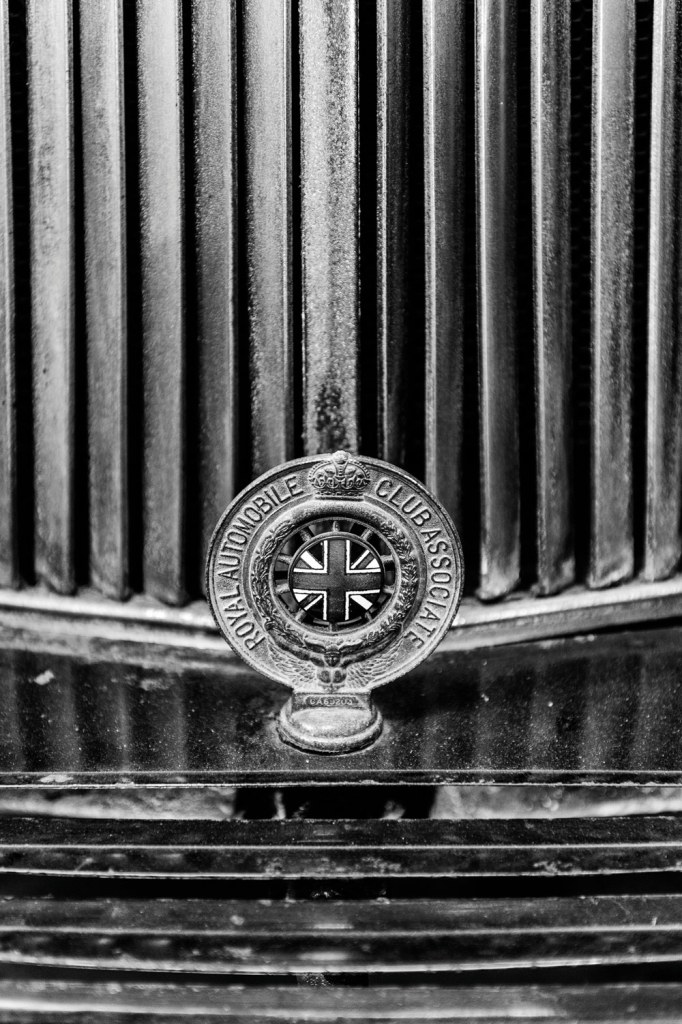 close up of royal automobile club associate symbol
