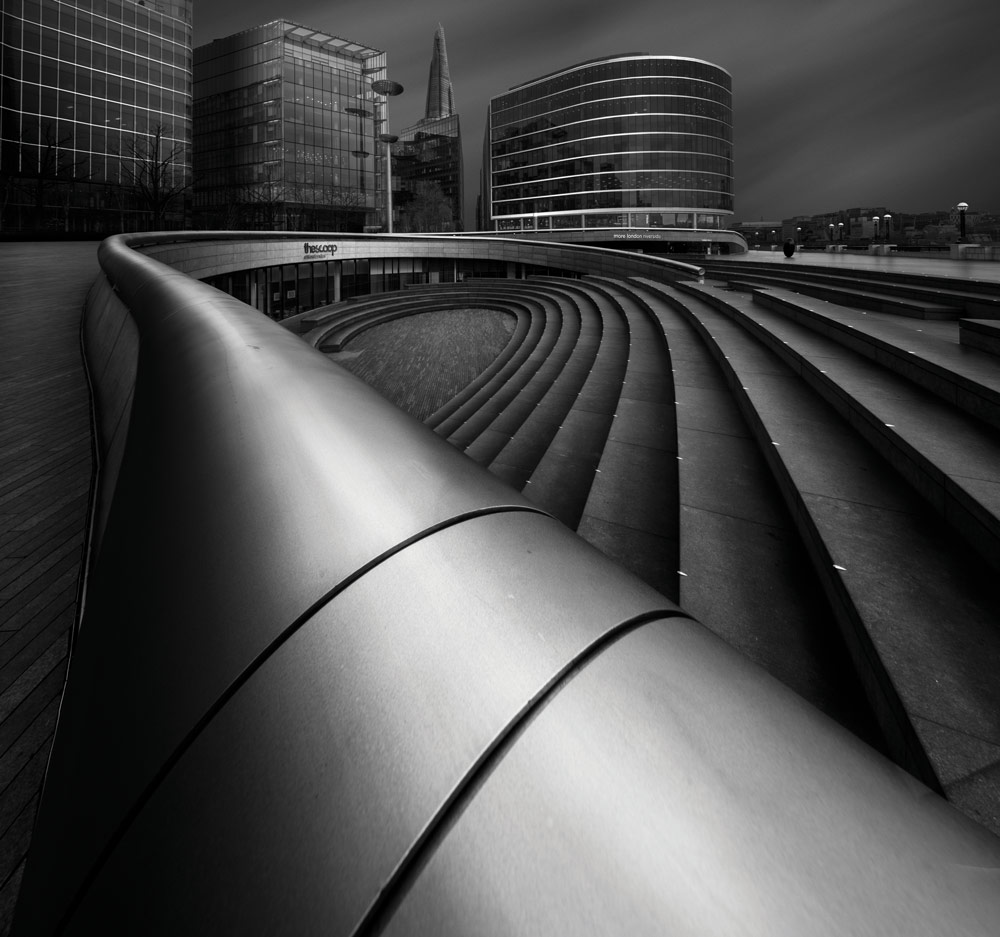 Black and white building photography cityscape with stairs and railing as leading line, Billy Currie